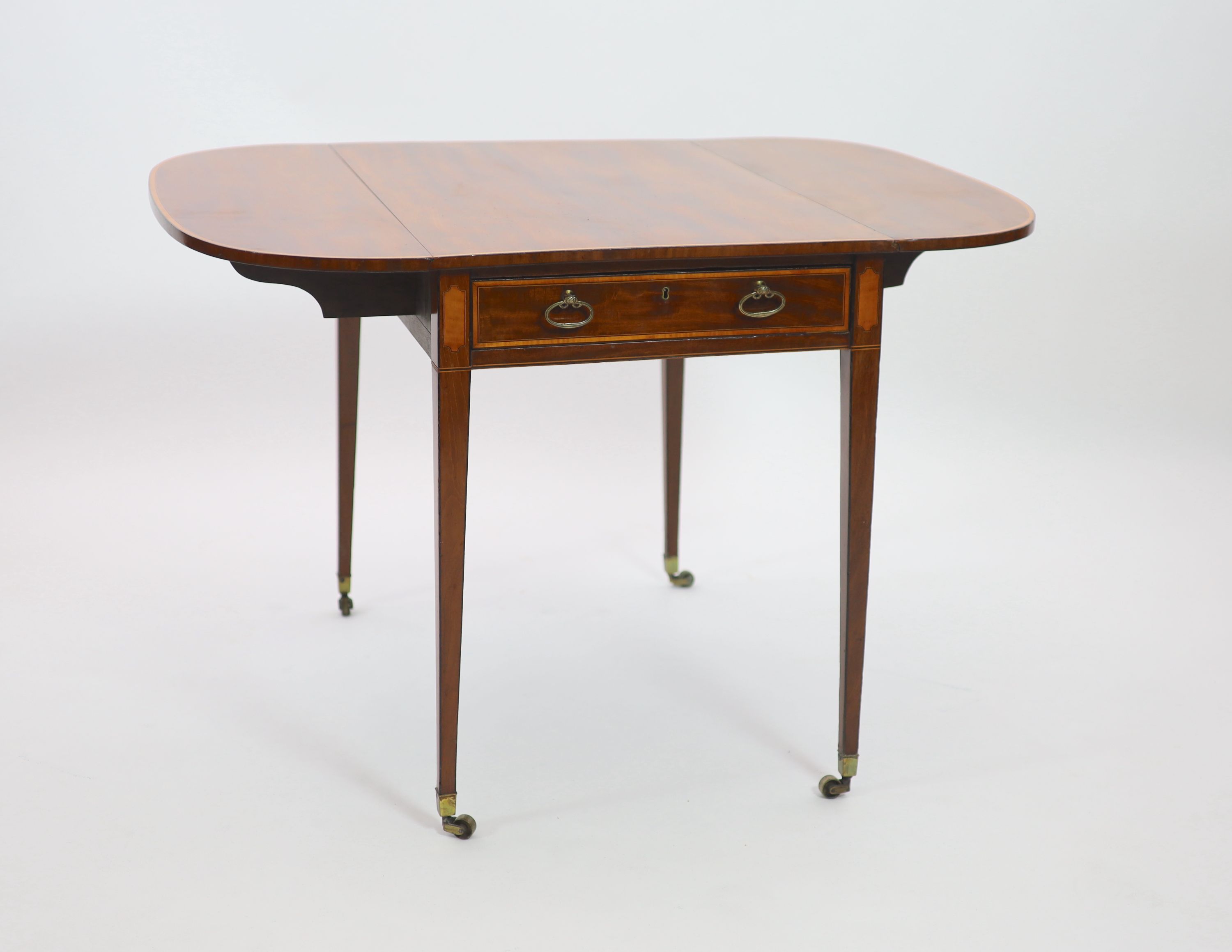 A George III satinwood banded mahogany Pembroke / games table, in the manner of Gillows of Lancaster, W.84cm D.56cm H.71cm